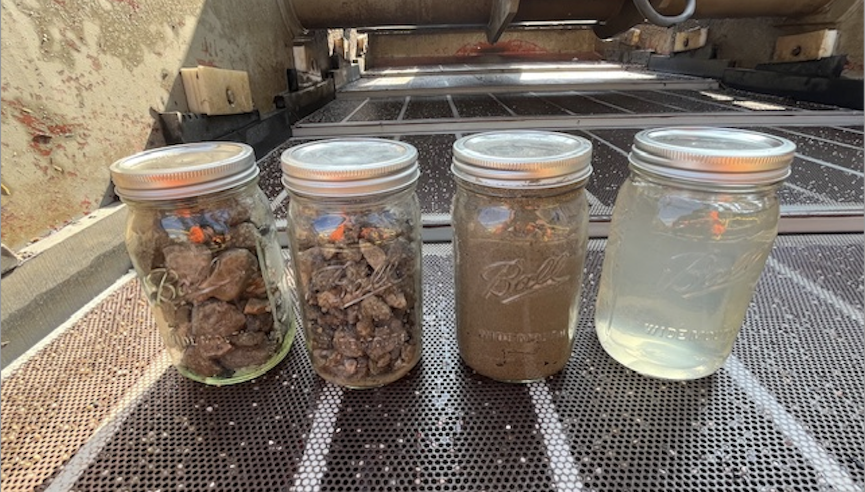 After: Jars with separated solids and clear liquid